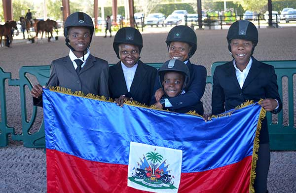 Participants with the Haitian flag.